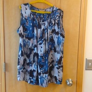 Large sleeveless top by Plisse.